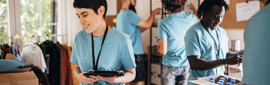 Volunteers sorting donations at charity drive
